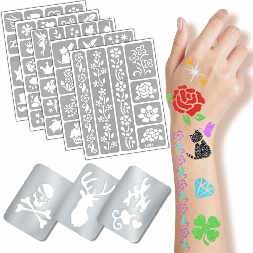 Hand with colorful temporary tattoos and various stencil designs.