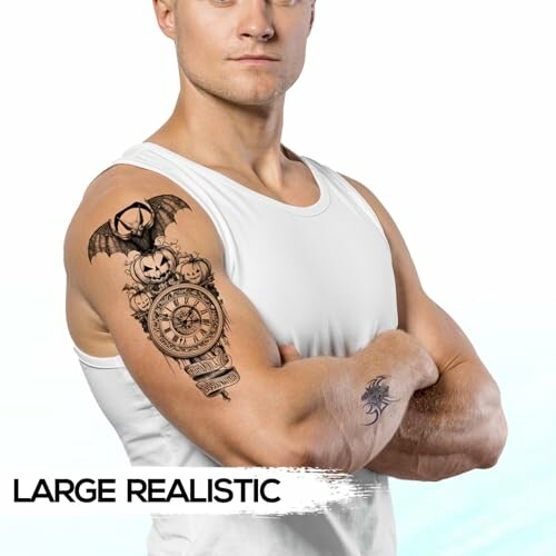 Man with detailed arm tattoos featuring skulls and a clock.