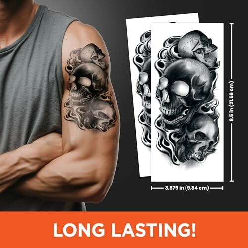 Person with a skull tattoo on their arm, featuring multiple skull designs.